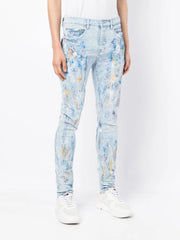 paint-splattered slim jeans