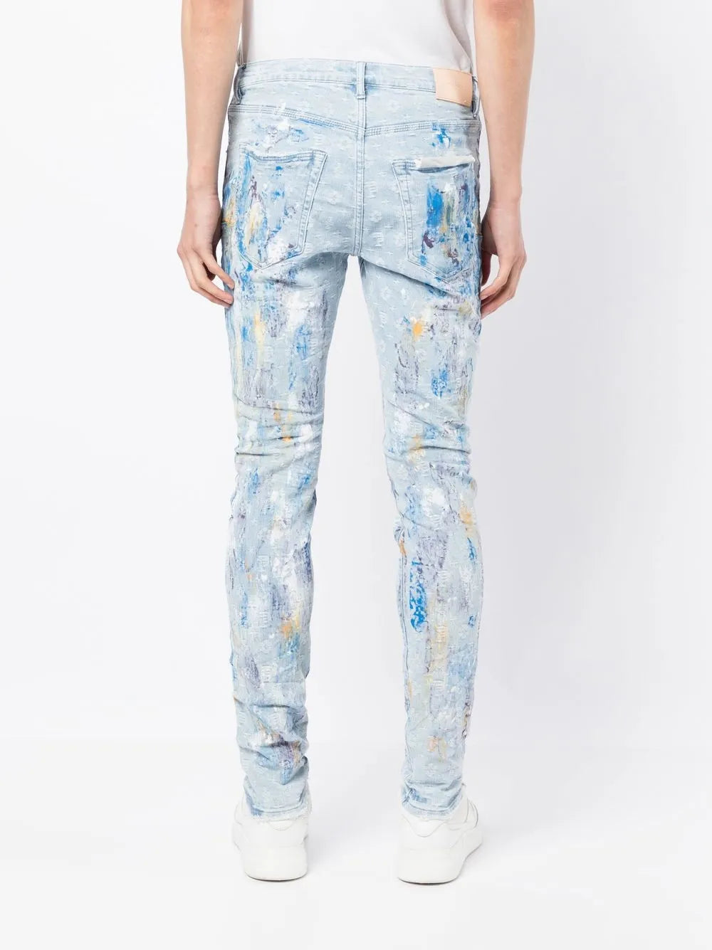 paint-splattered slim jeans