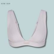 SKIMS Plunge-neck brand-patch recycled stretch-nylon bikini top