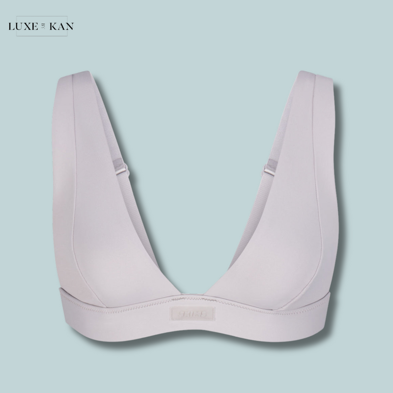 SKIMS Plunge-neck brand-patch recycled stretch-nylon bikini top