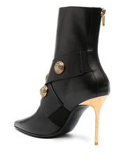 pointed-toe leather boots