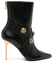 pointed-toe leather boots