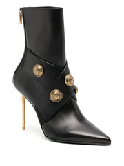 pointed-toe leather boots