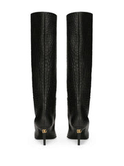 crocodile-embossed leather boots