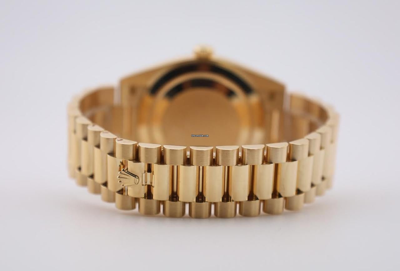 Rolex | Day-Date | 228238-0006 | Yellow gold | 40 mm | Yellow gold | Champagne | Automatic
