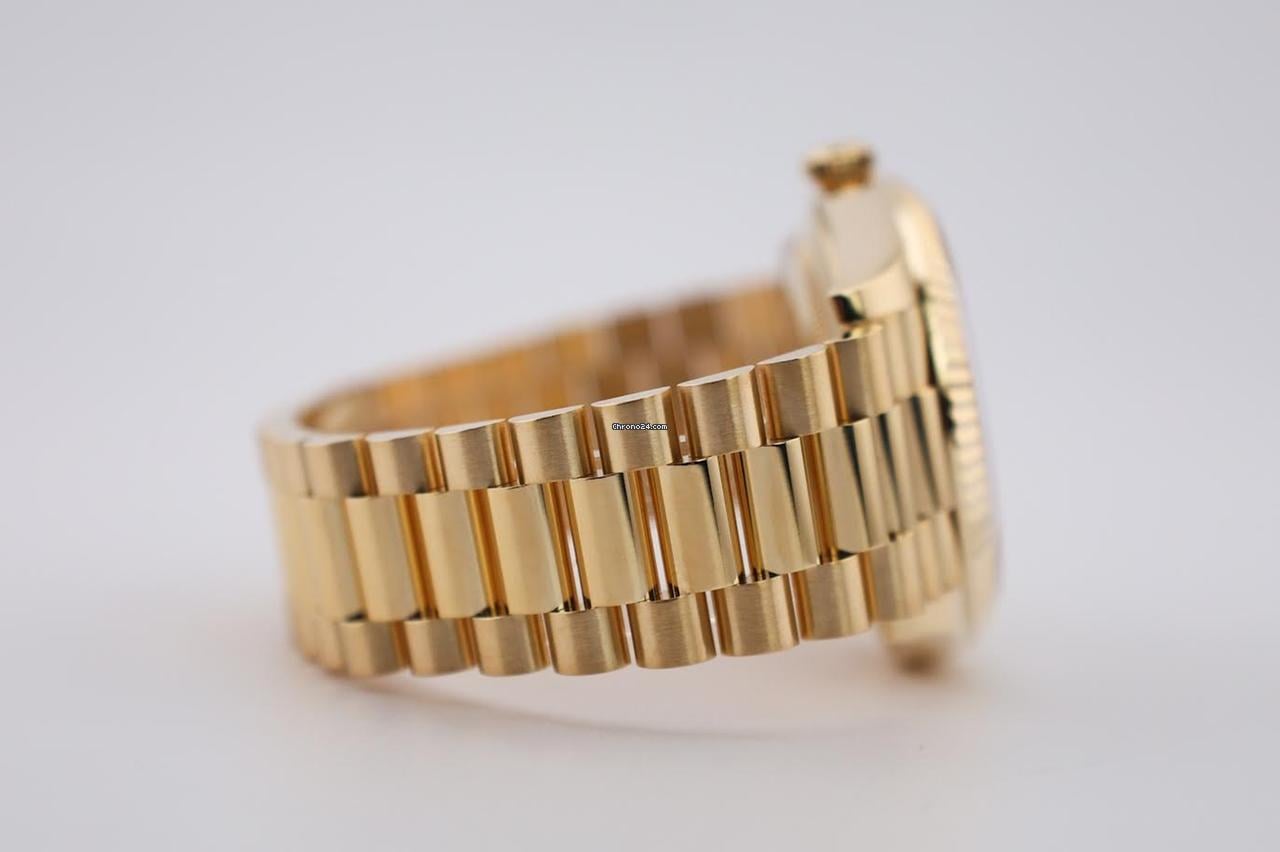 Rolex | Day-Date | 228238-0006 | Yellow gold | 40 mm | Yellow gold | Champagne | Automatic