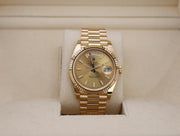 Rolex | Day-Date | 228238-0006 | Yellow gold | 40 mm | Yellow gold | Champagne | Automatic