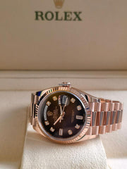 Rolex | Day-Date | 128235-0038 | Rose gold | 36 x 43 mm | Rose gold | Brown | Automatic