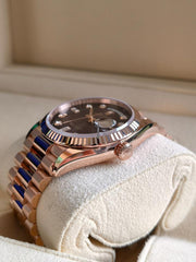 Rolex | Day-Date | 128235-0038 | Rose gold | 36 x 43 mm | Rose gold | Brown | Automatic