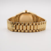 Rolex | Day-Date | 18018 | Yellow gold | 36 mm | Yellow gold | Black | Automatic