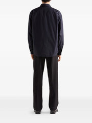 triangle-logo wool trousers