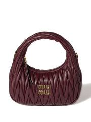 Wander matelassé shoulder bag