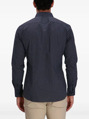 polka dot-patterned shirt