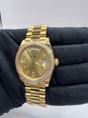 Rolex | Day-Date | 228348RBR | Yellow gold | 40 x 48 mm | Yellow gold | Gold | Automatic