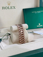 Rolex | Day-Date | 128345RBR | Rose gold | 36 x 43 mm | Rose gold | Green | Automatic