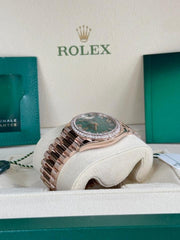 Rolex | Day-Date | 128345RBR | Rose gold | 36 x 43 mm | Rose gold | Green | Automatic