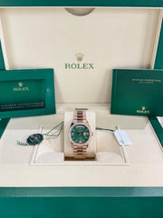 Rolex | Day-Date | 128345RBR | Rose gold | 36 x 43 mm | Rose gold | Green | Automatic