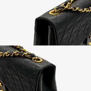 JAH231 - CHANEL Vintage Black Lambskin Maxi Classic Flap Bag