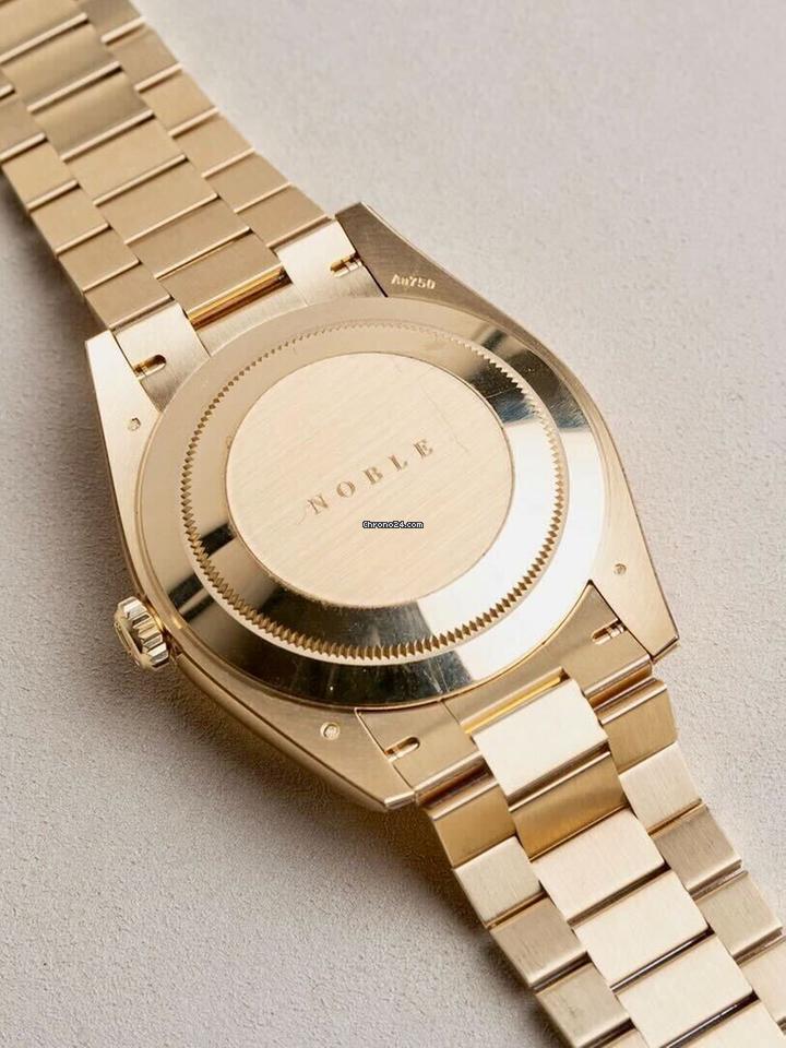 Rolex | Day-Date | 228238-0069 | Yellow gold | 40 mm | Yellow gold | Green | Automatic