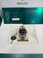 Rolex | Day-Date | 228348RBR | Yellow gold | 40 mm | Yellow gold | Black | Automatic