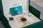 Rolex | 1908 | 52508 | Yellow gold | 39 mm | Yellow gold | Black | Automatic