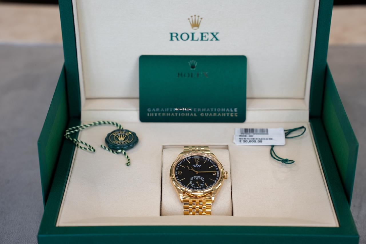 Rolex | 1908 | 52508 | Yellow gold | 39 mm | Yellow gold | Black | Automatic
