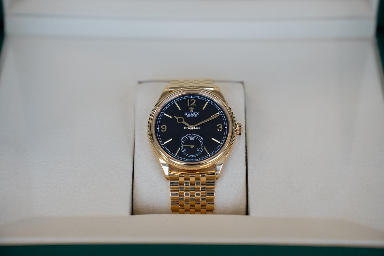 Rolex | 1908 | 52508 | Yellow gold | 39 mm | Yellow gold | Black | Automatic
