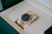 Rolex | 1908 | 52508 | Yellow gold | 39 mm | Yellow gold | Black | Automatic