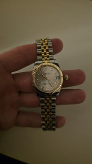 Rolex | Oyster Perpetual | 0127A039 | Yellow gold and steel | 31 mm | Silver | Gold | Automatic