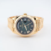 Rolex | Day-Date | 228238 | Yellow gold | 40 mm | Yellow gold | Green | Automatic