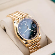 Rolex | Day-Date | 228238 | Yellow gold | 40 mm | Yellow gold | Green | Automatic