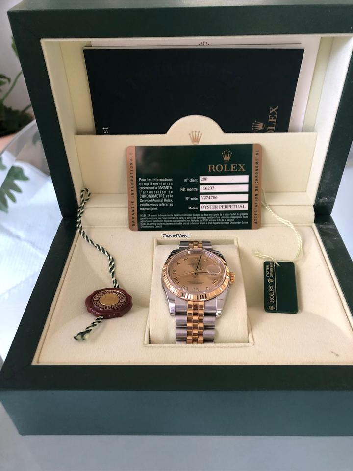 Rolex Oyster Perpetualyear 2009. Vintage. 18k gold. Stamps of authenticity.