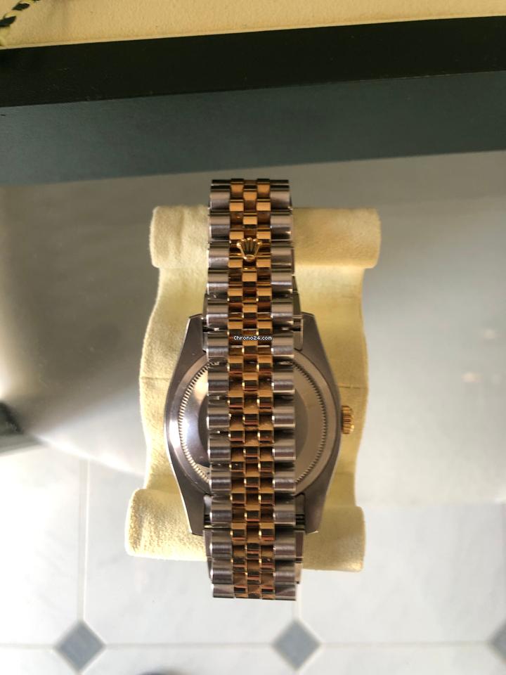 Rolex Oyster Perpetualyear 2009. Vintage. 18k gold. Stamps of authenticity.