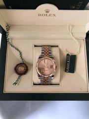 Rolex Oyster Perpetualyear 2009. Vintage. 18k gold. Stamps of authenticity.