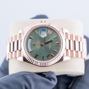 Rolex | Day-Date | 228235 | Red gold | 40 mm | Rose gold | Green | Automatic
