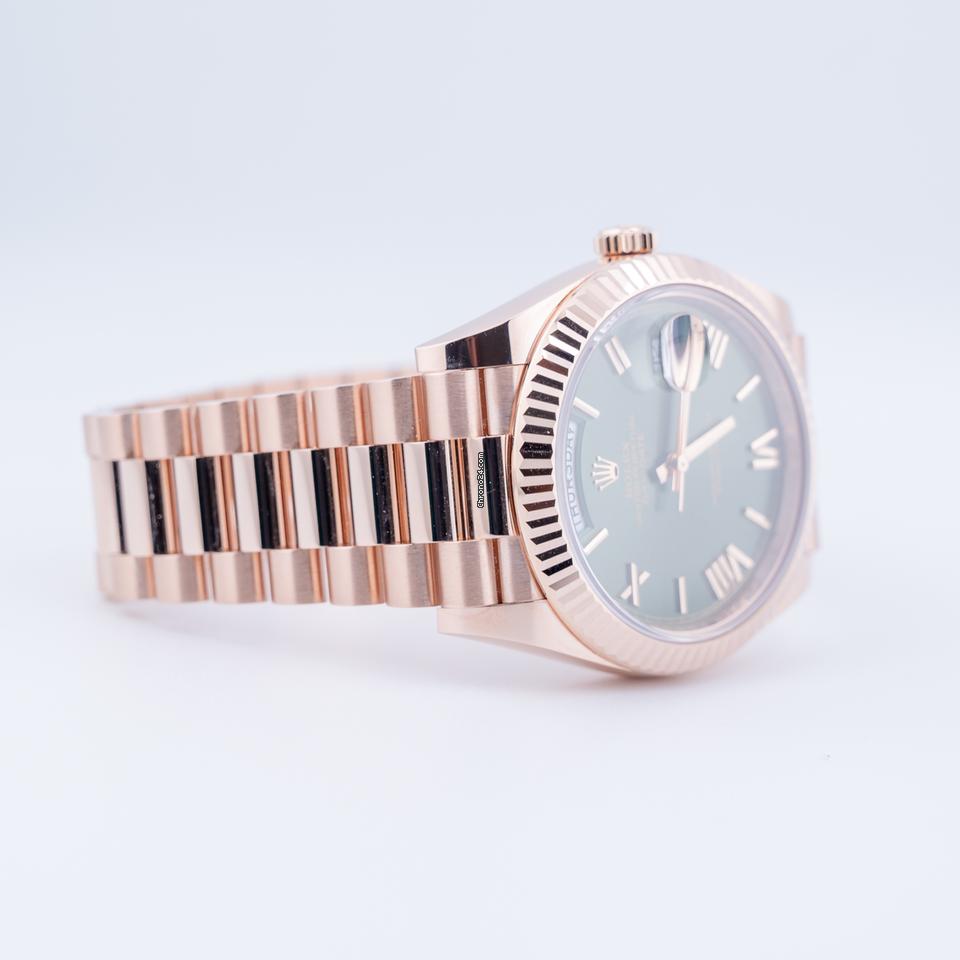 Rolex | Day-Date | 228235 | Red gold | 40 mm | Rose gold | Green | Automatic