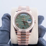 Rolex | Day-Date | 228235 | Red gold | 40 mm | Rose gold | Green | Automatic