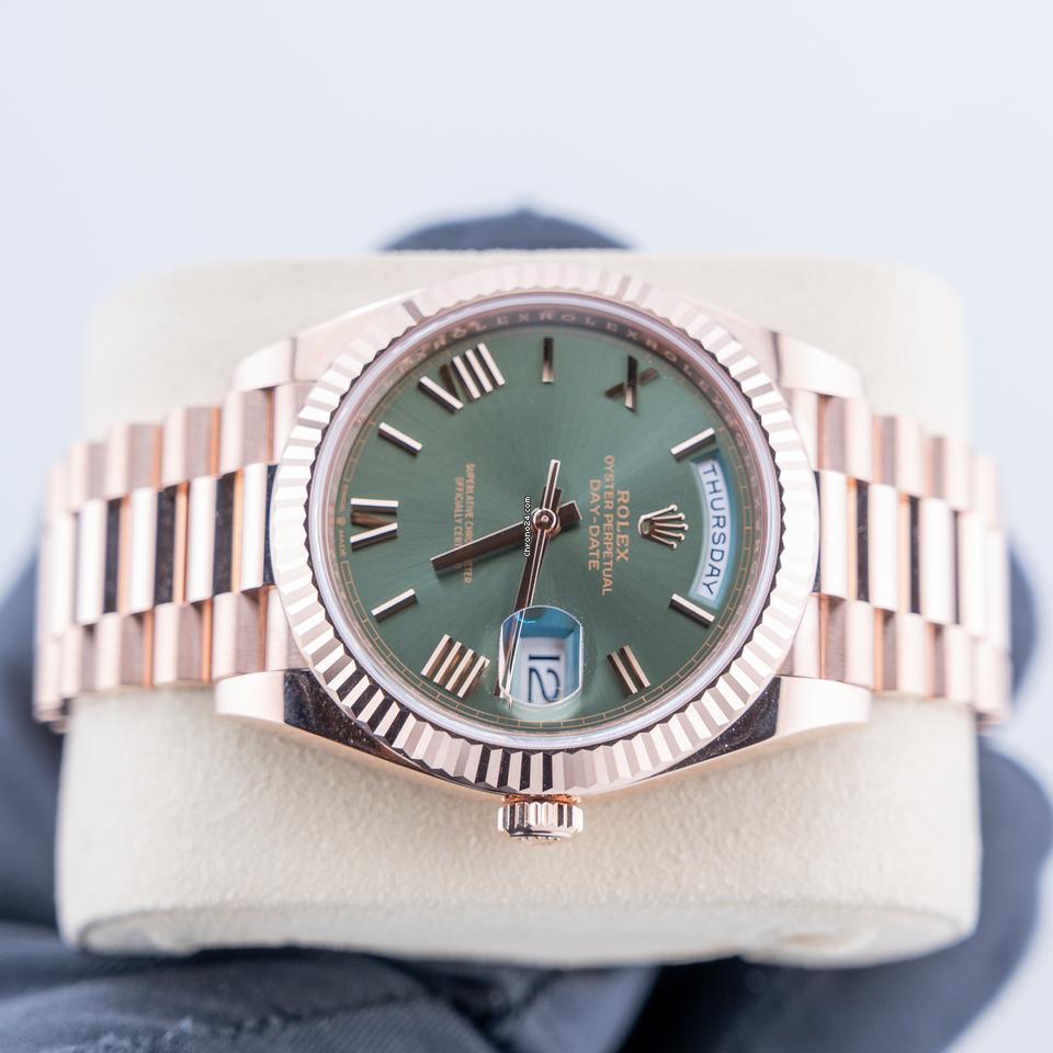 Rolex | Day-Date | 228235 | Red gold | 40 mm | Rose gold | Green | Automatic