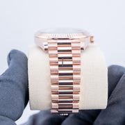 Rolex | Day-Date | 228235 | Red gold | 40 mm | Rose gold | Green | Automatic