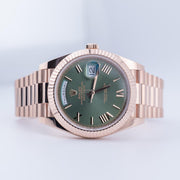 Rolex | Day-Date | 228235 | Red gold | 40 mm | Rose gold | Green | Automatic