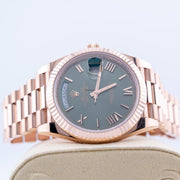 Rolex | Day-Date | 228235 | Red gold | 40 mm | Rose gold | Green | Automatic