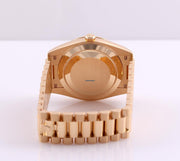 Rolex | Day-Date | 228398TBR-0042 | Yellow gold | 40 x 48 mm | Yellow gold | Green | Automatic