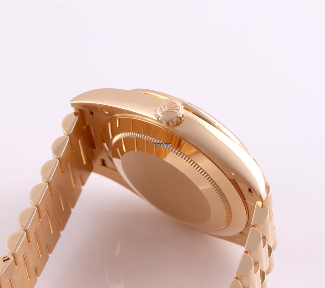 Rolex | Day-Date | 228398TBR-0042 | Yellow gold | 40 x 48 mm | Yellow gold | Green | Automatic