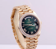 Rolex | Day-Date | 228398TBR-0042 | Yellow gold | 40 x 48 mm | Yellow gold | Green | Automatic