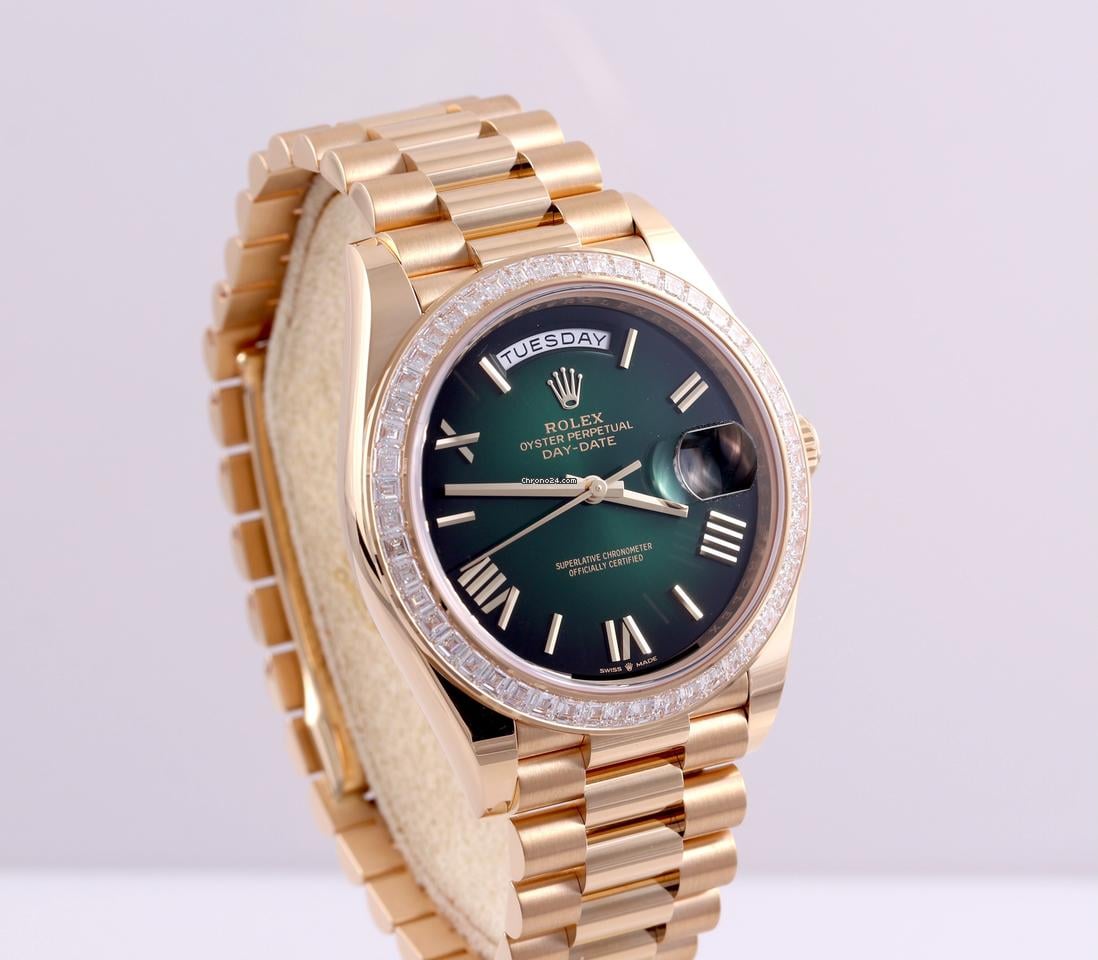Rolex | Day-Date | 228398TBR-0042 | Yellow gold | 40 x 48 mm | Yellow gold | Green | Automatic