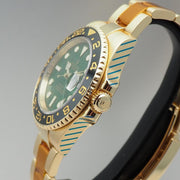 Rolex | GMT-Master II | 116718LN | Yellow gold | 40 mm | Yellow gold | Green | Automatic
