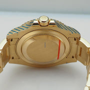 Rolex | GMT-Master II | 116718LN | Yellow gold | 40 mm | Yellow gold | Green | Automatic