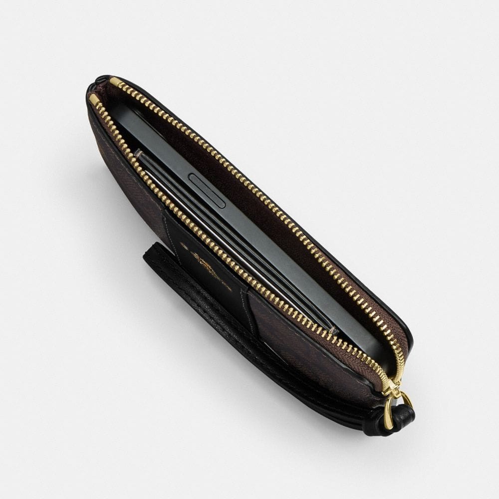 Coach Corner Zip Wristlet In Signature Canvas With Stripe Gold Sand Chalk
