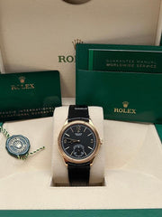 Rolex | 1908 | 52508 | Yellow gold | 39 mm | Crocodile skin | Black