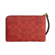 Coach Corner Zip Wristlet In Signature Canvas in Gold Crimson